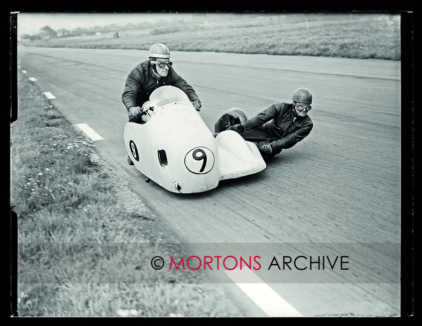 Aintree 1956 03 
 Aintree 1956 - John Harris, brother of Pip with T Plant in the chair of the Norton 
 Keywords: 1956, Aintree, Glass Plates, Mortons Archive, Mortons Media Group Ltd, Racing, September, Straight from the plate, The Classic MotorCycle