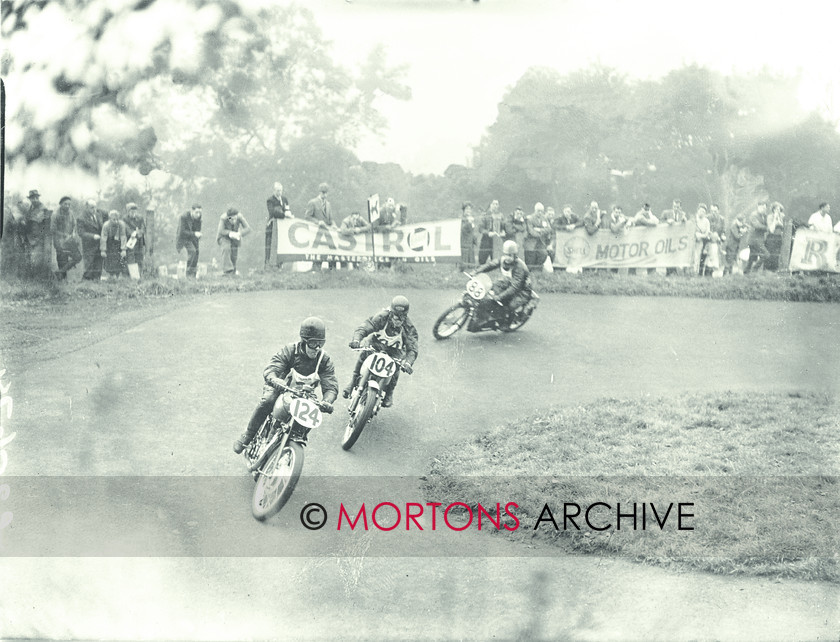062 SFTP C25674 
 Martin again, this time on his 500cc Gilera, with a Grand Prix Triumph adn MkVIII KTT Velocette in pursuit. 
 Keywords: 1949, May, Mortons Archive, Mortons Media Group, Oliver's Mount, Scarborough, Straight from the plate, The Classic MotorCycle