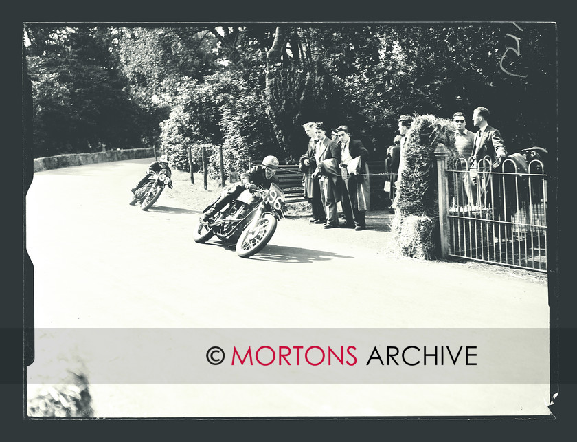 SFTP April 2012 - 3 
 Phil Carter (38, Norton) chases Ivor Lloyd (96, AJS) Lloyd emigrated to Canada in 1957, where he continued racing - and winning - for 18 years. 
 Keywords: 2010, Aberdare road races 1954, April, Mortons Archive, Mortons Media Group, Straight from the plate, The Classic MotorCycle