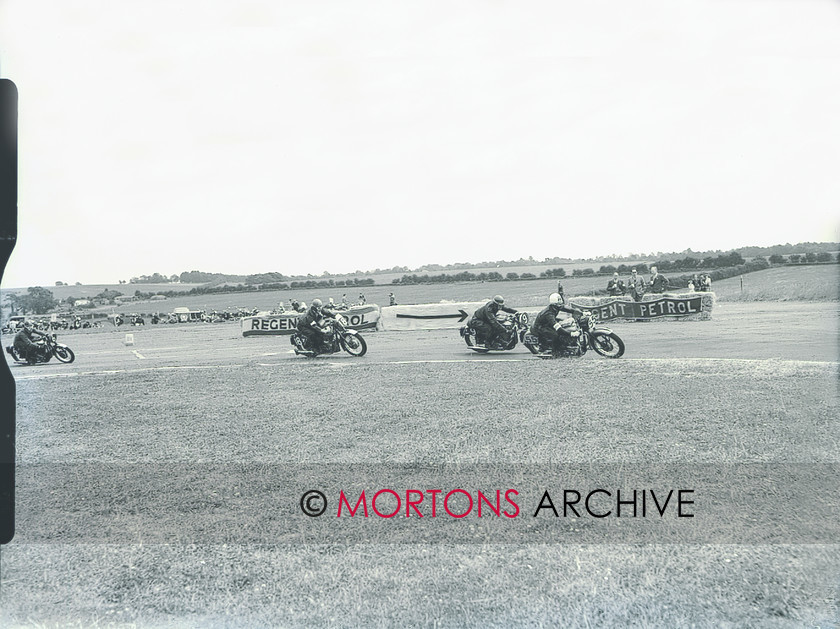 plate 1728-15 
 The Tait/Bryen Tiger 110 leads the Webber/Avery Goldie and the Dunn/Broomfield Viper. 
 Keywords: 1956, July 2011, Mortons Archive, Mortons Media Group, Straight from the plate, The Classic MotorCycle, Thruxton