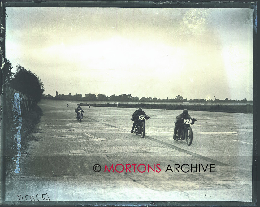 036 brooklands 03 
 Longman (AJS), Simpson (AJS) and Weatherell (Weatherell) in the early part of the 350cc race. 
 Keywords: June 2011, Mortons Archive, Mortons Media Group, Straight from the plate, The Classic MotorCycle