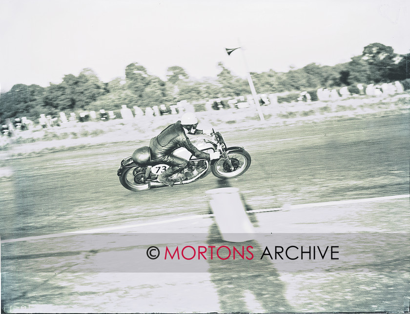 hutchinson 15470-17 
 Double winner Ken Kavanagh on his Featherbed Manx. 
 Keywords: 1953, Hutchinson 100, May 11, Mortons Archive, Mortons Media Group, Silverstone, Straight from the plate, The Classic MotorCycle