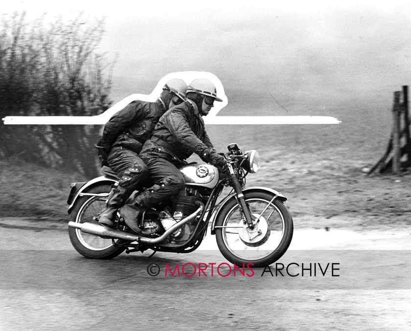 Goldie 17 
 Not really what youd expect Sensibly clad riders, two-up touring, in the rain. They were all-rounders, after all, these Gold Stars. 
 Keywords: BSA, Gold Star, Mortons Archive, Mortons Media Group
