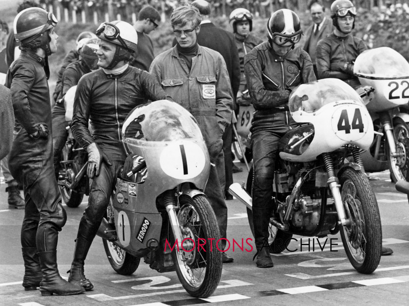 General M Mallory Park01 
 Images used by Lewis Leathers - Giacomo Agostini chats with Mike Hailwood (seated No. 1) on a 500cc Seeley, No. 44 Ken Redfern (745 Domiracer), No. 22 John Cooper (500cc Seeley) at Mallory Park 21st September 1969 
 Keywords: Clothing, Mortons Archive, Mortons Media Group Ltd, Nick Nicholls