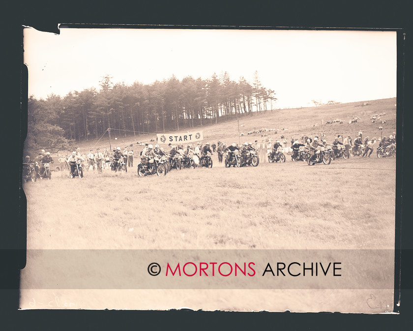 064 SFTP 01 
 Organised chaos at the start of event two, for 350cc machines, Number 30 is eventual winner Geoff Ward. 
 Keywords: 2012, Glass plate, January, Lancashire Grand National 1956, Mortons Archive, Mortons Media Group, Straight from the plate, The Classic MotorCycle