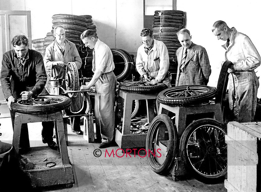 Manx 10C 
 10C – It’s all action in the Dunlop depot as they prepare for the 1947 TT. 
 Keywords: 2012, Exhibition of historic images, Manx Grand Prix, Mortons Archive, Mortons Media Group, Mountain Milestones - Memories from Mona's Isle