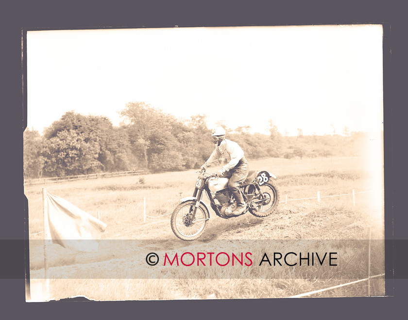 064 SFTP 06 
 The imperious Jeff Smith, who was to enjoy so much success in motorcross for years to come. 
 Keywords: 2012, Glass plate, January, Lancashire Grand National 1956, Mortons Archive, Mortons Media Group, Straight from the plate, The Classic MotorCycle