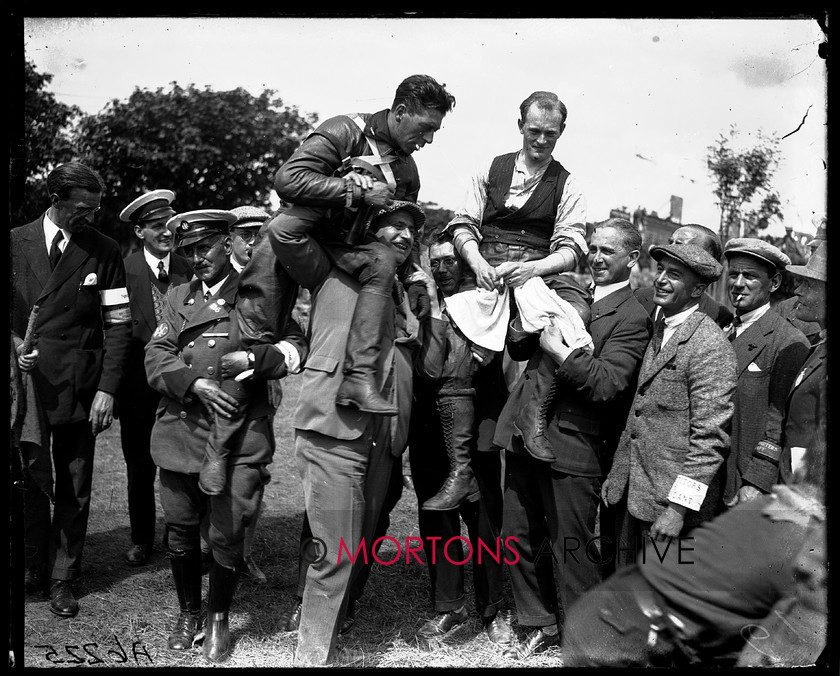 A6225 
 TT Junior/Lightweight 1926. Pietro Ghersi (left) and Paddy Johnston, first two in the preliminary results, are hoisted aloft following the Lightweight TT. 
 Keywords: 1926, a6225, glass plate, isle of mann, junior, lightweight, Mortons Archive, Mortons Media Group Ltd, Straight from the plate, the classic motorcycle