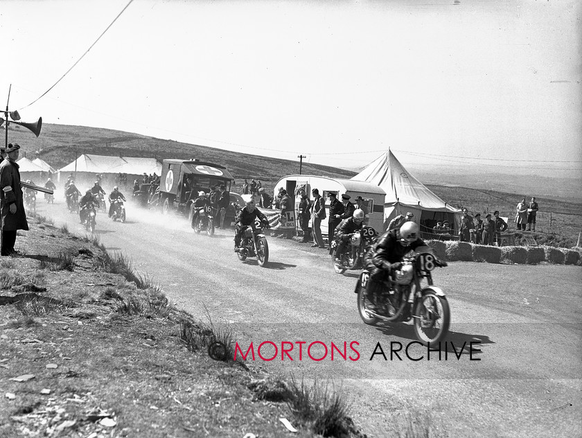 15198-10 
 Eppynt Road Race 1953. Start of first race of the day. Note number two, CA Richards on a Douglas. 
 Keywords: 15198-10, 1953, April 2010, eppynt road race, glass plate, may, race 1, racing, road, road race, start, Straight from the plate, tcm, The Classic Motorcycle