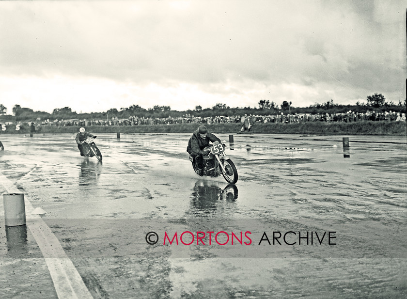 SFTP 1954 Hutchinson 100 01 
 1954 Hutchinson 100 held at a wet Silverstone 
 Keywords: 2016, April, Glass plate, Hutchison, Mortons Archive, Mortons Media Group Ltd, Straight from the plate, The Classic MotorCycle