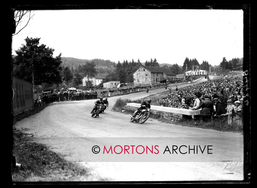 053 SFTP 04 
 1930 European Grand Prix in Belgium, July 17 - at Spa Franchorchamps - Stanley Woods (Nortons), Graham Walker (Rudge) and Jimmy Guthrie (AJS) taking the bend after the stands. 
 Keywords: 2014, Belgian Grand Prix, Glass plates, Mortons Archive, Mortons Media Group Ltd, September, Straight from the plate, The Classic MotorCycle