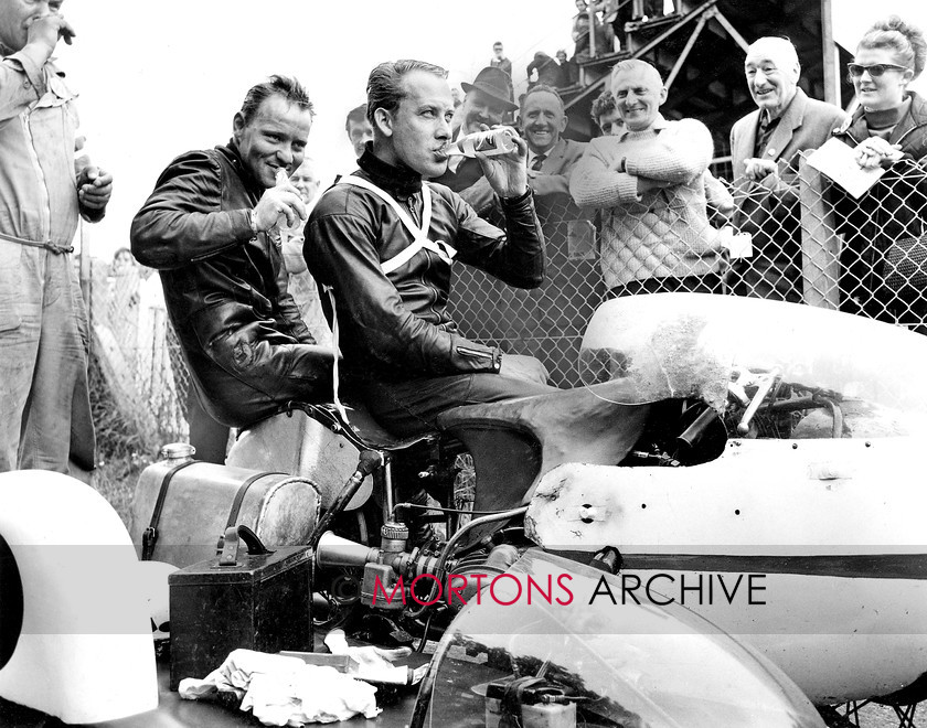 Manx 18C 
 19C – Emil Horner looks rightly pleased with his ride with Max Deubel in the 1965 TT. 
 Keywords: 2012, Exhibition of historic images, Manx Grand Prix, Mortons Archive, Mortons Media Group, Mountain Milestones - Memories from Mona's Isle