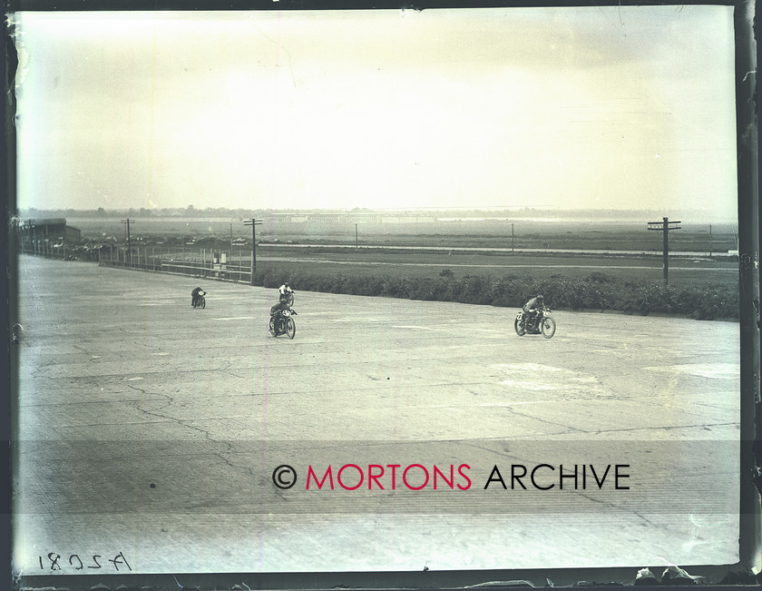 036 brooklands 05 
 Wide nature of Brooklands track is brilliantly illustrated ion this picture. 
 Keywords: June 2011, Mortons Archive, Mortons Media Group, Straight from the plate, The Classic MotorCycle