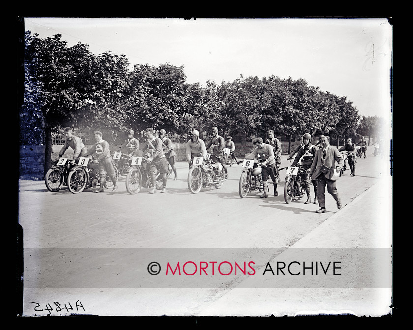 062 SFTP 01 1925 IOM Junior TT 
 1925 Junior TT - Riders wheel to the start. From left No. 2 Eddie Twemlow, (New Imperial), No. 3 Jock Porter, (New Gerrard), No. 4 Stanley Woods, Royal Enfield, No. 5 Tom Sheard, (Douglas), No. 6 Freddie Dixon, (Douglas), No. 7 Tommy De La Hay (Sunbeam), others No. 8 Stannard (Montgomery and No. 14 Rex Judd (Douglas). 
 Keywords: Glass plate, Isle of Man, Junior TT, Mortons Archive, Mortons Media Group, September, Straight from the plate, The Classic MotorCycle