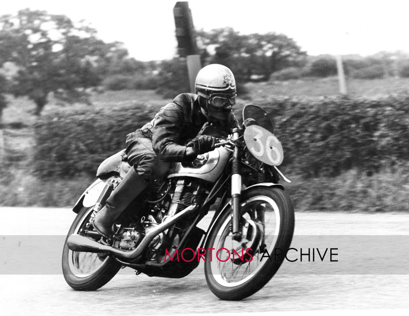 Goldie 09 
 G Lattimer hustles his Goldie in practice for the 1955 Manx GP. 
 Keywords: BSA, Gold Star, Mortons Archive, Mortons Media Group