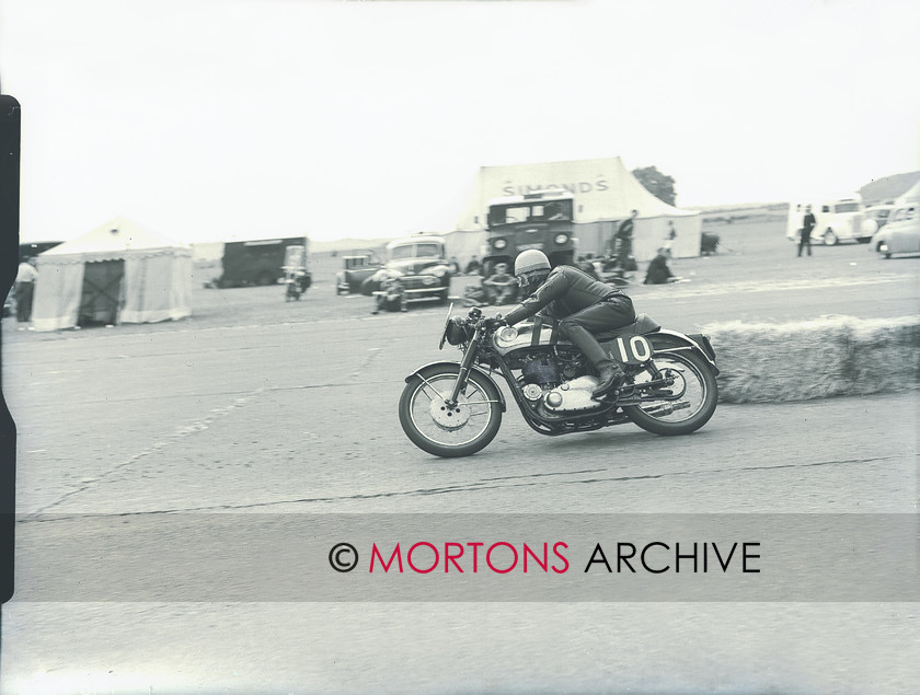 plate 1728 3 
 Ivor Lloyd, victorious with partner Ken James on their 350cc Goldie. 
 Keywords: 1956, July 2011, Mortons Archive, Mortons Media Group, Straight from the plate, The Classic MotorCycle, Thruxton