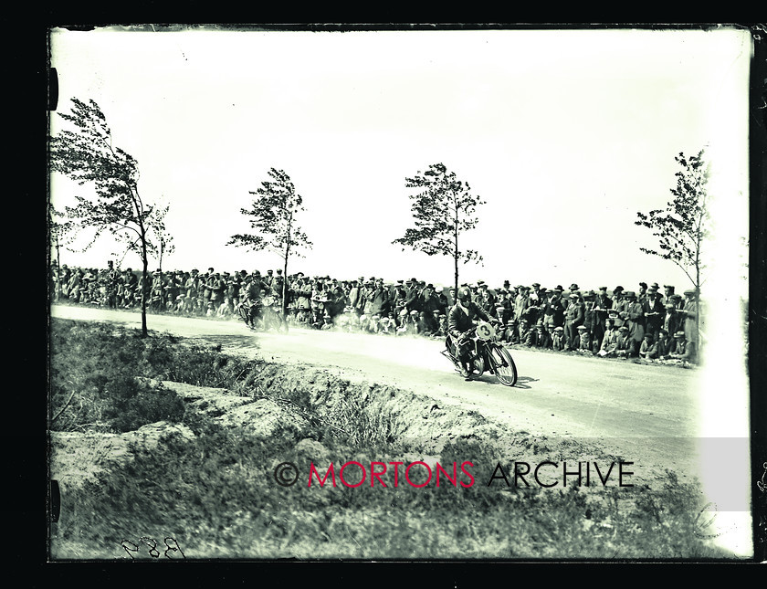 059 Dutch TT 1928 05 
 Magnus (DKW) in the 175cc race, leading Les Crabtree (Excelsior) through Laaghalerveen 
 Keywords: Action, Dutch, Glass Plate Collection, Mortons Archive, Mortons Media Group Ltd, Road racing, Straight from the plate, TT