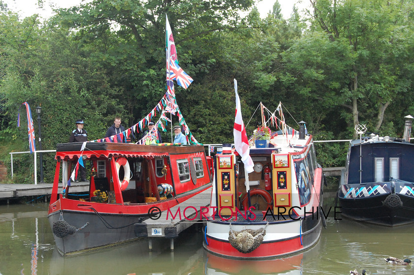 Braunston rally 2014 (119) 
 Please enjoy our album of photos from the Braunston Historic Narrowboat Rally and Canal Festival over the weekend of June 28-29, 2014. The annual event at Braunston Marina was preceded by a Centennial Tribute to the Fallen of Braunston in the First World War which took place at Braunston War Memorial and was led by the Rev Sarah Brown with readings by Timothy West and Prunella Scales. Visitors to the rally also included Canal & River Trust chairman Tony Hales on Saturday and chief executive Richard Parry on Sunday. 
 Keywords: 2014, Braunston Rally, June, Mortons Archive, Mortons Media Group Ltd, Towpath Talk