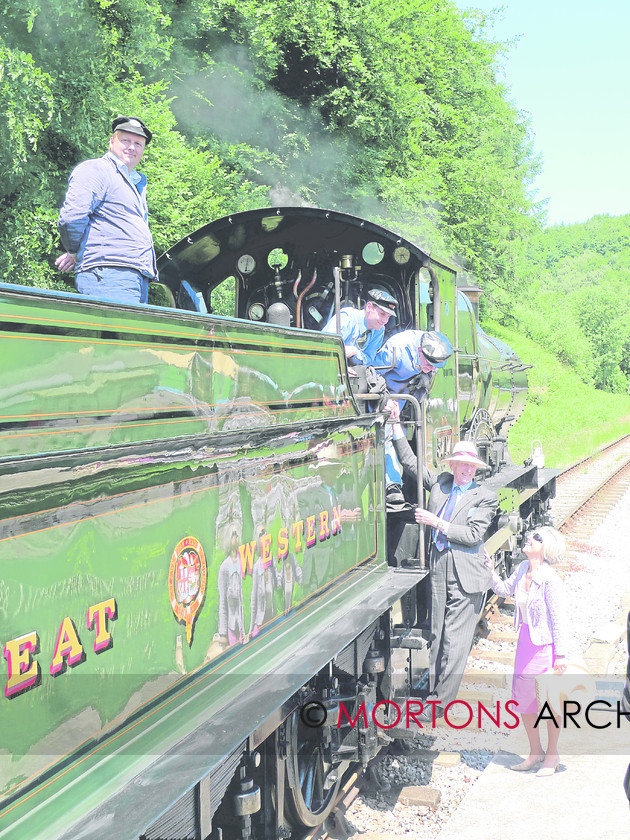 WD584758@20 NEWS 2 HR139 
 The Lord-Lieutenant of Glousestershire, Sir Henry Elwes KCVO, climbs aboard City of Truro at Parkend on 16th June. 
 Keywords: Dean Forest celebrates its bicentenary, Event, event: 200th anniversary, feature News 20 and 21, HR 139, issue 139, make GWR, Mortons Media Group, number City of Truro, person(s) name The Lord-Lieutenant of Gloucestershire, place Dean Forest, publication HR, Sir Henry Elwes KCVO