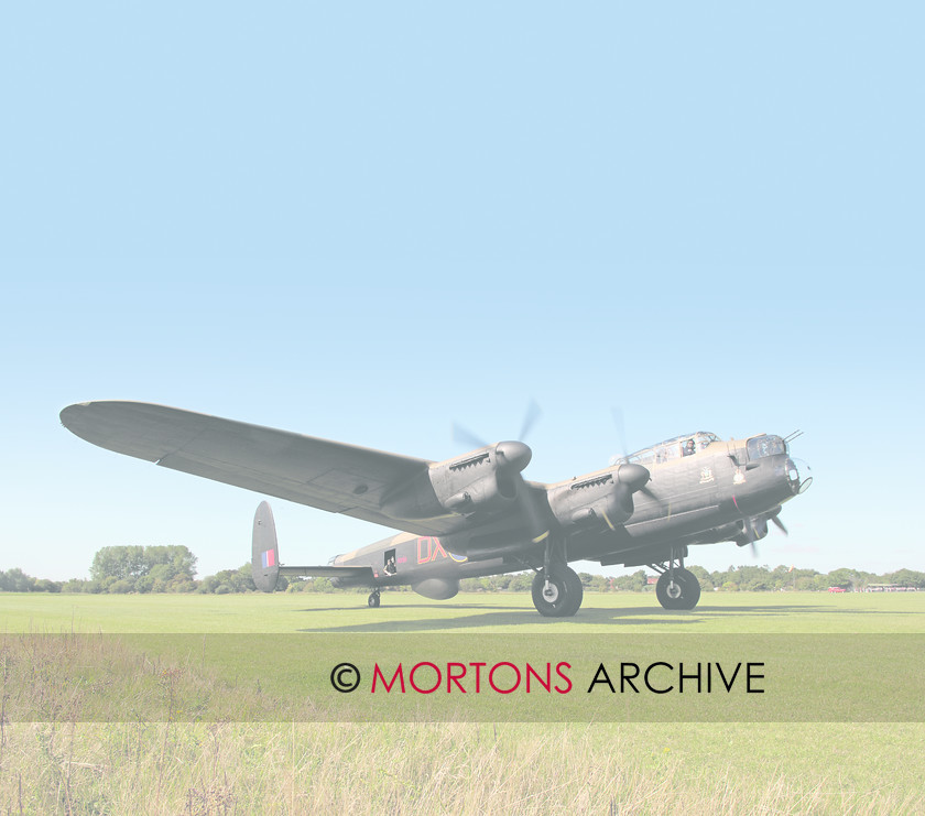 WD524946@94 EK 1 
 NX611 Lancaster at East Kirkby. 
 Keywords: Aviation Classics, copyright single use only, date ?, event ?, feature EK, issue 1, make Avro, model Lancaster, Mortons Archive, Mortons Media Group, person(s) name ?, photographer Jarrod Cotter, place East Kirkby, publication Aviation, type VII, year 1945