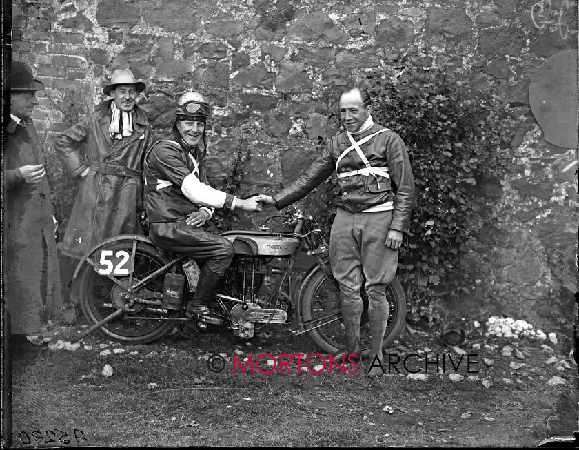 059 SFTP 02 
 Glass plates - The 1925 Ulster Grand Prix - Joe Craig int he saddle of the Norton being congratulated by Jimmy Shaw 
 Keywords: 1925, December, Mortons Archive, Mortons Media Group Ltd, Motor Cycle, Racing, Straight from the plate, The Classic MotorCycle, Ulster GP