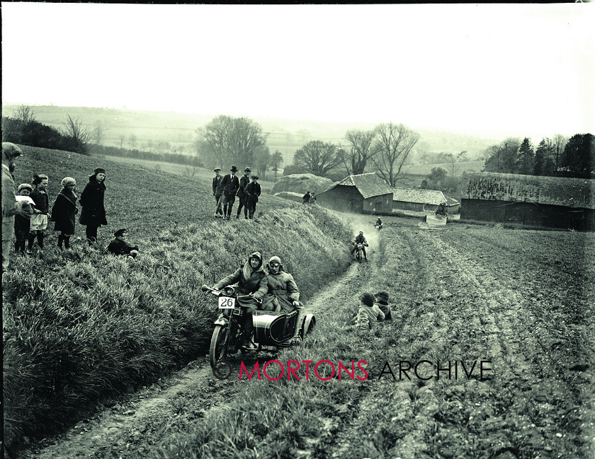 TCM 059 Glass Plates4 
 1923 Suffolk trial - Cornhall Hill proves easy for the sidecarist G R Kingsley (Dunelt) but difficuilt for the following solo rider, C H Brooman (Charter-Lea). 
 Keywords: 1923, Glass Plate Collection, Mortons Archive, Mortons Media Group Ltd, Straight from the plate, The Classic MotorCycle