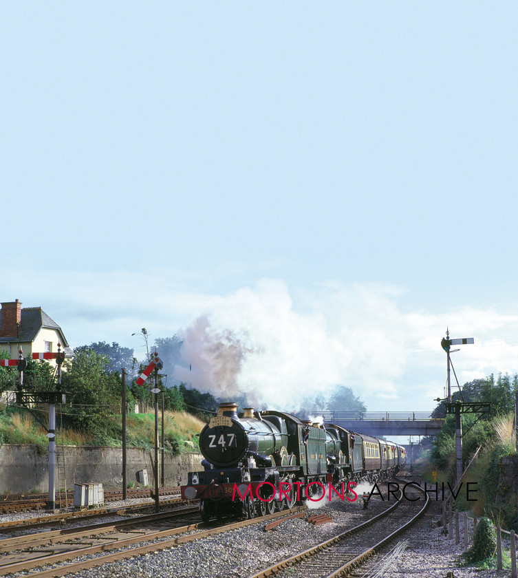 WD594792@64 preservation 00 
 GWR 4-6-0s No 5051 Drysllwyn Castle adn No 7029 Clun Castle speed through Tiverton Parkway with a GW150 special on 1st September 1985. 
 Keywords: Heritage Railway, Mortons Archive, Mortons Media Group