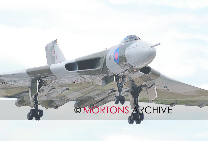 XH558 7 
 XH558 flies over the 'piano keys' on the threshold of RAF Waddington's runway. 
 Keywords: Aviation Classics, Issue 7 Vulcan, Mortons Archive, Mortons Media Group