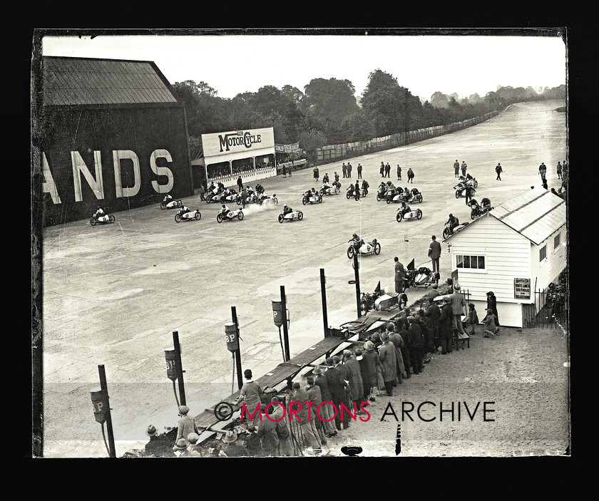 062 SFTP 08 
 Thrills, spills and new world records Brooklands, 1927. Start of the 350cc race. Number 26 is eventual victor Wal Handley. 
 Keywords: 2014, Glass plates, July, Mortons Archive, Mortons Media Group Ltd, Straight from the plate, The Classic MotorCycle
