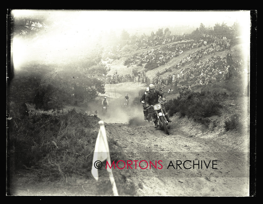 062 SFTP 07 
 Sunbeam point-to-point, April 1953 - Vic Eastwood on his Gold Star; note the banks of spectators in the background. 
 Keywords: 2013, Glass plate, Mortons Archive, Mortons Media Group, October, Point to point, Straight from the plate, Sunbeam, The Classic MotorCycle