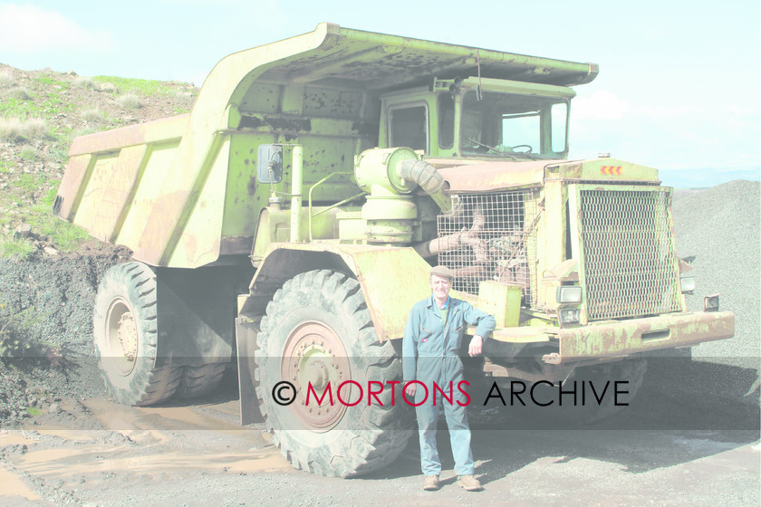 robertson 
 Ian demonstrates the size of the huge Terex vehicle used in the family's quarrying operations on the farm. 
 Keywords: Mortons Archive, Mortons Media Group Ltd, TFH, tractor farming heritage, June 2005, dumper