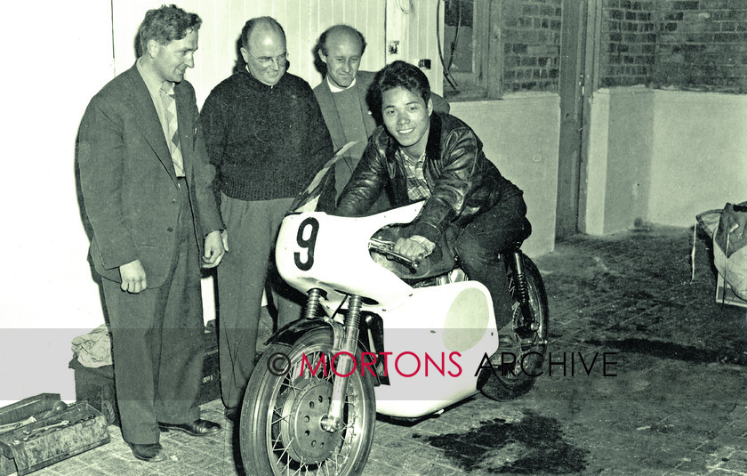 SFTP 1961 TT 06 
 1961 Isle of Man TT - Japanese risder Fumio Ito sat in the saddle of Derek Minter's Manx with Derek and the engine builder Steve Lancefield looking on. 
 Keywords: 1961, Isle of Man, Mortons Archive, Mortons Media Group Ltd, Straight from the plate, The Classic MotorCycle, TT