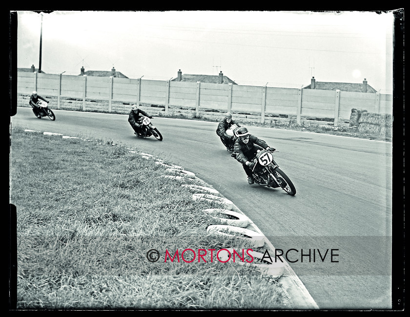 Aintree 1956 01 
 Aintree 1956 - Roy Mayhew leads a gaggle of machines round Anchor Crossing 
 Keywords: 1956, Aintree, Glass Plates, Mortons Archive, Mortons Media Group Ltd, Racing, September, Straight from the plate, The Classic MotorCycle