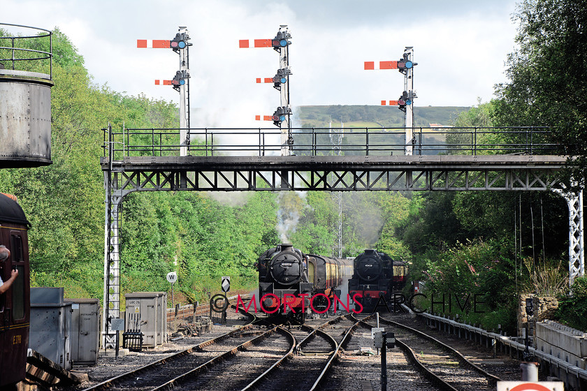 020 44806 Grosmont 
 LMS Black Five, 4-6-0 No. 44806 runs under the newly-commissioned Falsgrave signal gantry at Grosmont. 
 Keywords: 2015, Heritage Railway, Issue 198, Mortons Archive, Mortons Media Group Ltd, Train