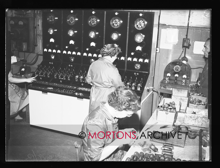 19674-12 
 Villiers engineering, Wolverhampton. Scooter engine production, electronic test on coils. 
 Keywords: 1959, 19674-12, August 2009, colis, electronic test on coils, engine, glass plate, Mortons Archive, Mortons Media, Mortons Media Group Ltd., production, scooter, scooter engine production, Straight from the plate, test, The Classic MotorCycle, villiers, villiers engineering, wolverhampton