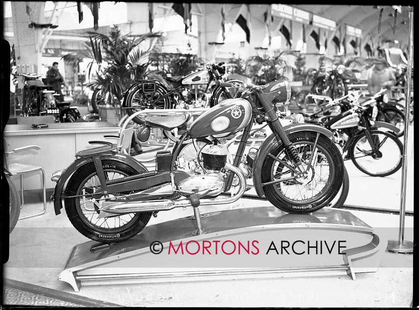 14054-11 
 1951 Dutch Motorcycle Show. Unorthodox German 150cc Mars 'Stella', with Sachs two-stroke engine. 
 Keywords: 14054-11, 1951, dutch, dutch motorcycle show, glass plate, motorcycle show, November 09, show, Straight from the plate, The Classic Motorcycle