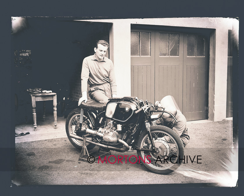 SFTP TT Practice 1957 05 
 A hive of activity in the Peel garages. 
 Keywords: 1957 Practice TT, Issue, Mortons Archive, Mortons Media Group, October 2011, Straight from the plate, The Classic MotorCycle