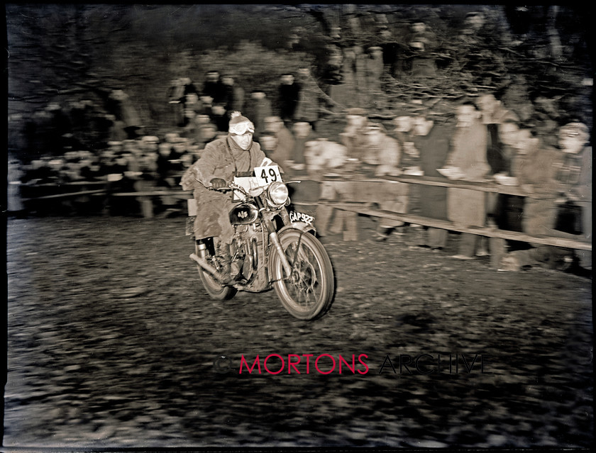 062 lands end 49 15151-24 
 1953 Lands End Trial - Pressing on through the night is H A Appleby, on his AJS single. 
 Keywords: 2013, February, Glass plate, Mortons Archive, Mortons Media Group, Straight from the plate, The Classic MotorCycle, Trials