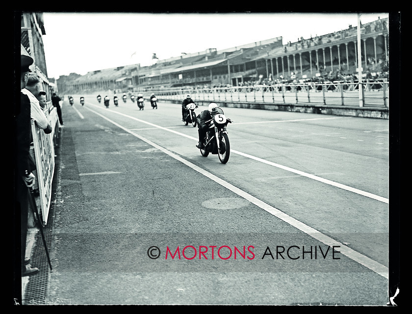 Aintree 1956 06 
 Aintree 1956 - Bob McIntyre leads the field and went on to win both 350 adn 500cc events. 
 Keywords: 1956, Aintree, Glass Plates, Mortons Archive, Mortons Media Group Ltd, Racing, September, Straight from the plate, The Classic MotorCycle