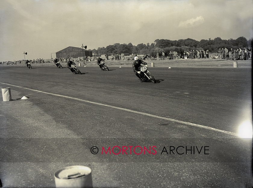 hutchinson 15470-23 
 Arthur Wheeler (Guzzi), Benny Rood (Velocette) and Cecil Sandford (Velo) , in a 250cc class scrap. 
 Keywords: 1953, Hutchinson 100, May 11, Mortons Archive, Mortons Media Group, Silverstone, Straight from the plate, The Classic MotorCycle