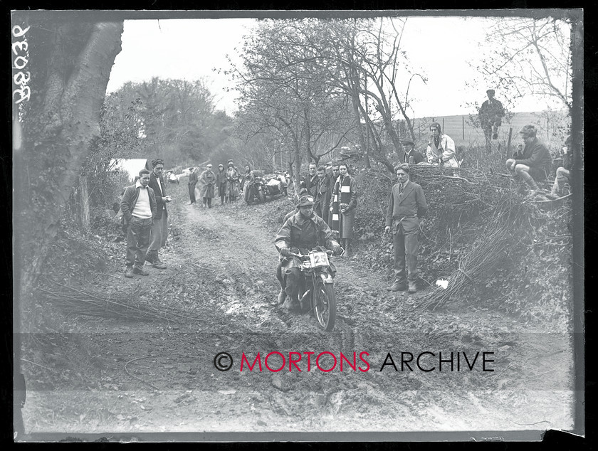 TCM FTP 06 
 Carshalton Motorcycle Club's Pillion Trial, May 1932. Ploughing a muddy furrow, an Ariel rider and passenger. 
 Keywords: glass plate, Mortons Archive, Mortons Media Group Ltd, Straight from the plate