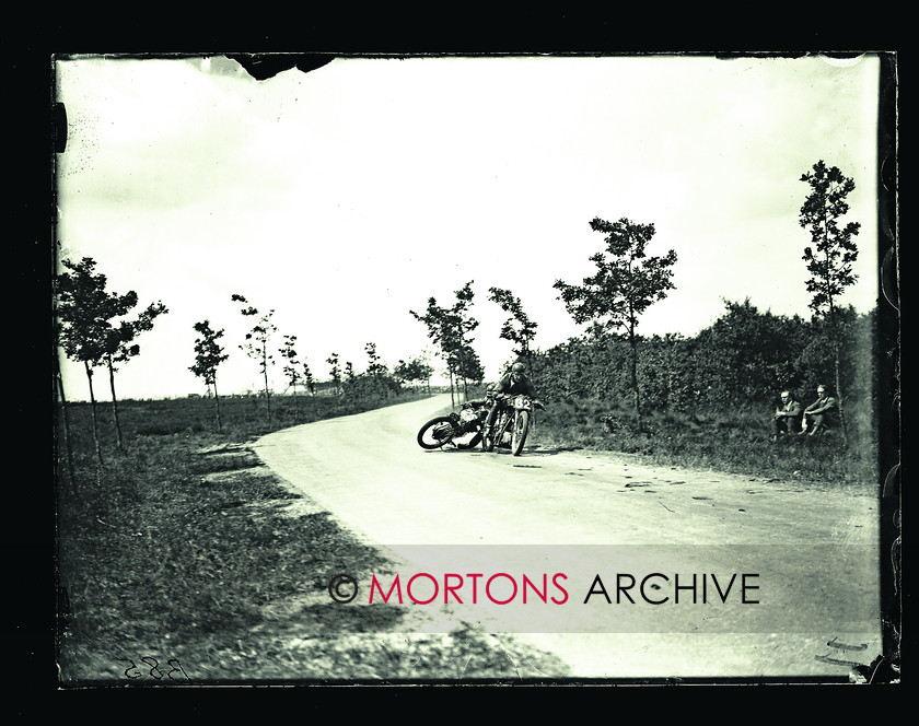 059 Dutch TT 1928 07 
 The beginning of the crash involving Hough (AJS) and Matinelli (Motosacoche). It put both riders out. 
 Keywords: Action, Dutch, Glass Plate Collection, Mortons Archive, Mortons Media Group Ltd, Road racing, Straight from the plate, TT