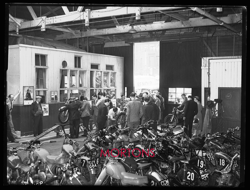 15199-02 
 1953 Scottish Six Days Trial (SSDT). Machines are weighed in prior to the event beginning. 
 Keywords: 15199-01, 1953, 6 day trial, glass plate, may 1953, Mortons Archive, Mortons Media, scottish, Straight from the plate, The Classic Motorcycle, trial, 15199-02, 15199-03, 15199-04, 15199-05, 15199-06, 15199-07, 15199-08, 15199-09, 15199-10, 15199-11, 15199-12, 15199-13