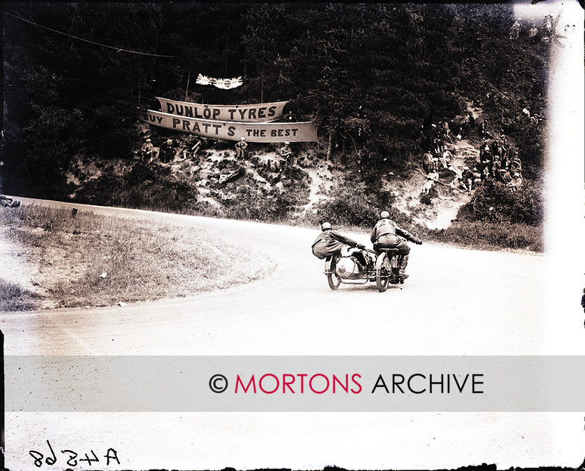 062 FROM THE PLATE 04 
 George Grinton (588cc Norton) takes a wide line through Ramsey Hairpin. 
 Keywords: 1925 Sidecar TT, 2011, December, Mortons Archive, Mortons Media Group, Sidecars, Straight from the plate, The Classic MotorCycle