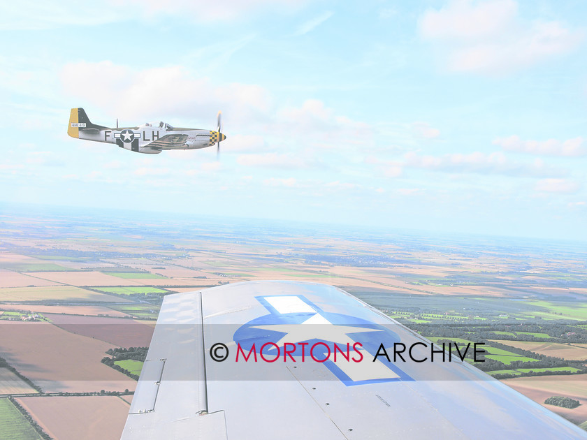 WD548091@6 Intro 1 
 Three Mustangs in formation over Colchester, Essex enroute to Fowimere, Cambridgeshire. 
 Keywords: Aviation Classics, Issue 2 Mustang, Mortons Archive, Mortons Media Group