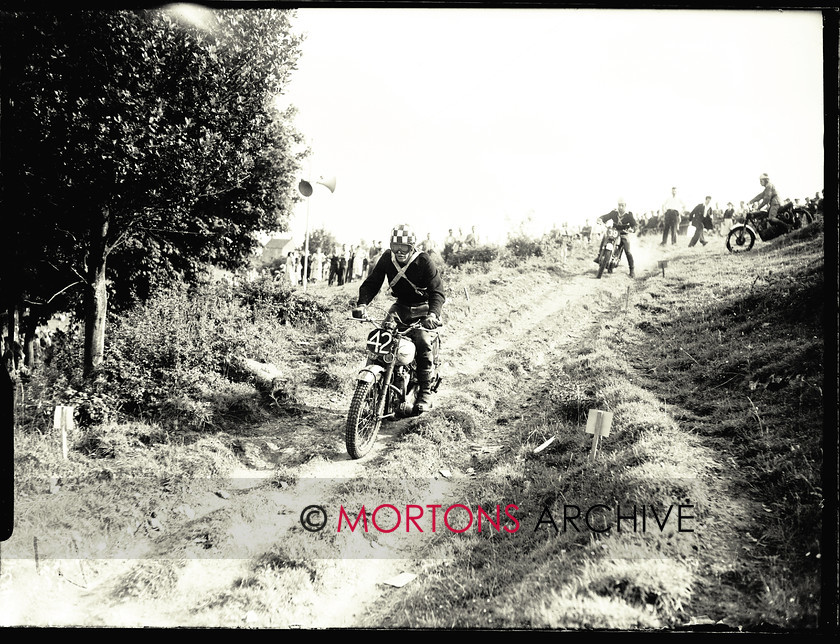 053 SFTP 05 
 Cotswold Scramble, June 1953 - Malcolm Prestage maintains forward momentum on his Triumph twin in the Senior event 
 Keywords: 2014, Glass plates, June, Mortons Archive, Mortons Media Group Ltd, Scrambling, Straight from the plate, The Classic MotorCycle