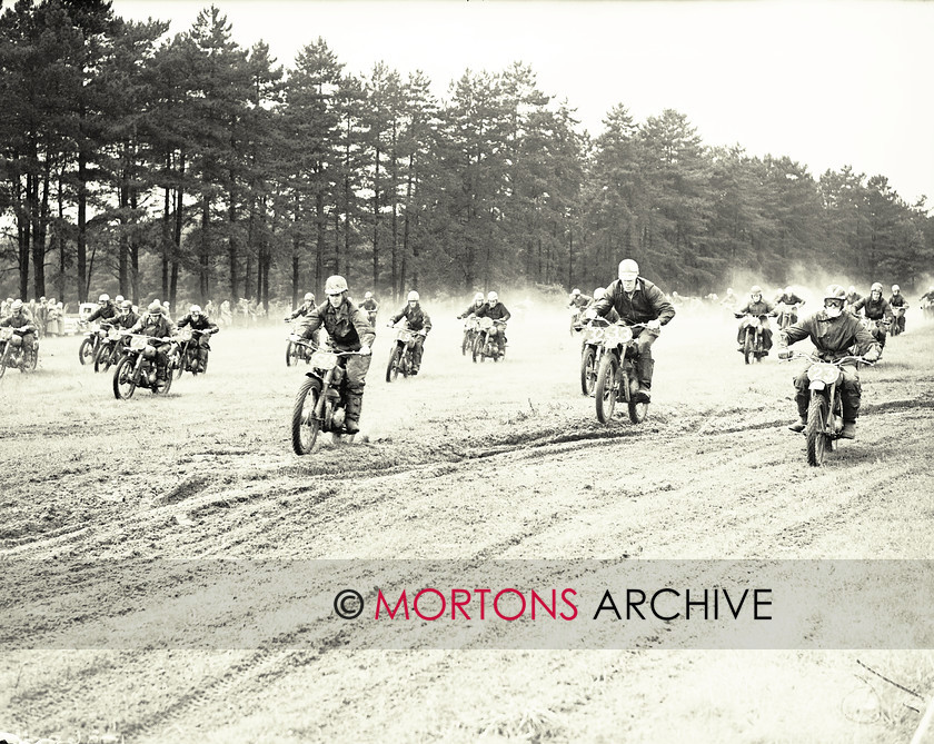 062 SFTP 11 
 Shrubland Park Scramble, August 1956. - Lightweights stream away from the start line; note the width of the course. 
 Keywords: 2012, Glass plate, June, Mortons Archive, Mortons Media Group, Scramble, Straight from the plate, The Classic MotorCycle