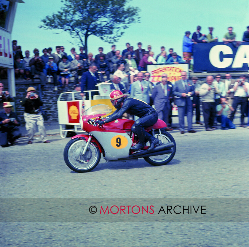 Agostini-018 
 Ready for the off on the start line of the 1967 Senior TT, Giacomo Agostini on the MV-3 
 Keywords: 1967 Senior TT, Giacomo Agostini, Isle of Man, Mortons Archive, Mortons Media Group, Nick Nicholls