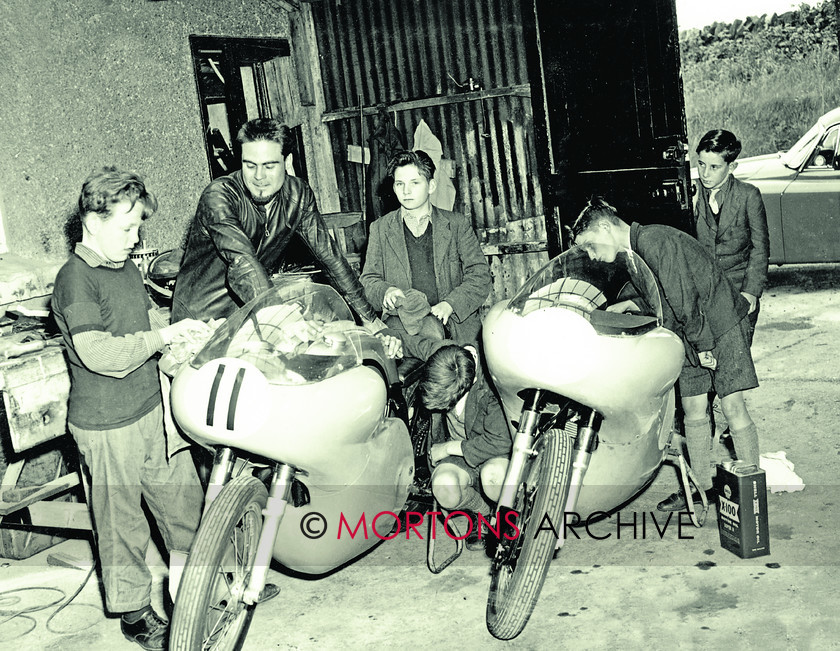 SFTP 1961 TT 02 
 1961 Isle of Man TT - Paddy Driver chats to a group of young enthusiasts in the pits 
 Keywords: 1961, Isle of Man, Mortons Archive, Mortons Media Group Ltd, Straight from the plate, The Classic MotorCycle, TT