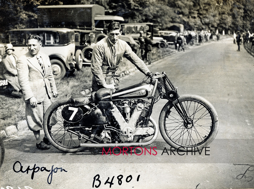 064 SFTP 05 
 Record breakers, Arpajon August 1930 - Purposeful doesn't even begin to do it justice - the one-off, 1000cc AJS V-twin. Owen Baldwin poses with it. 
 Keywords: 2012, December, Mortons Archive, Mortons Media Group, Straight from the plate, The Classic MotorCycle